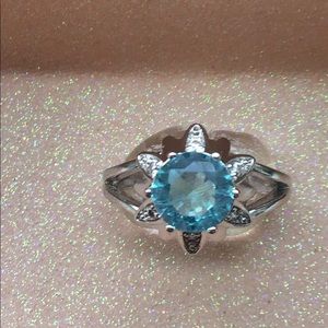 Blue simulated gemstone ring.